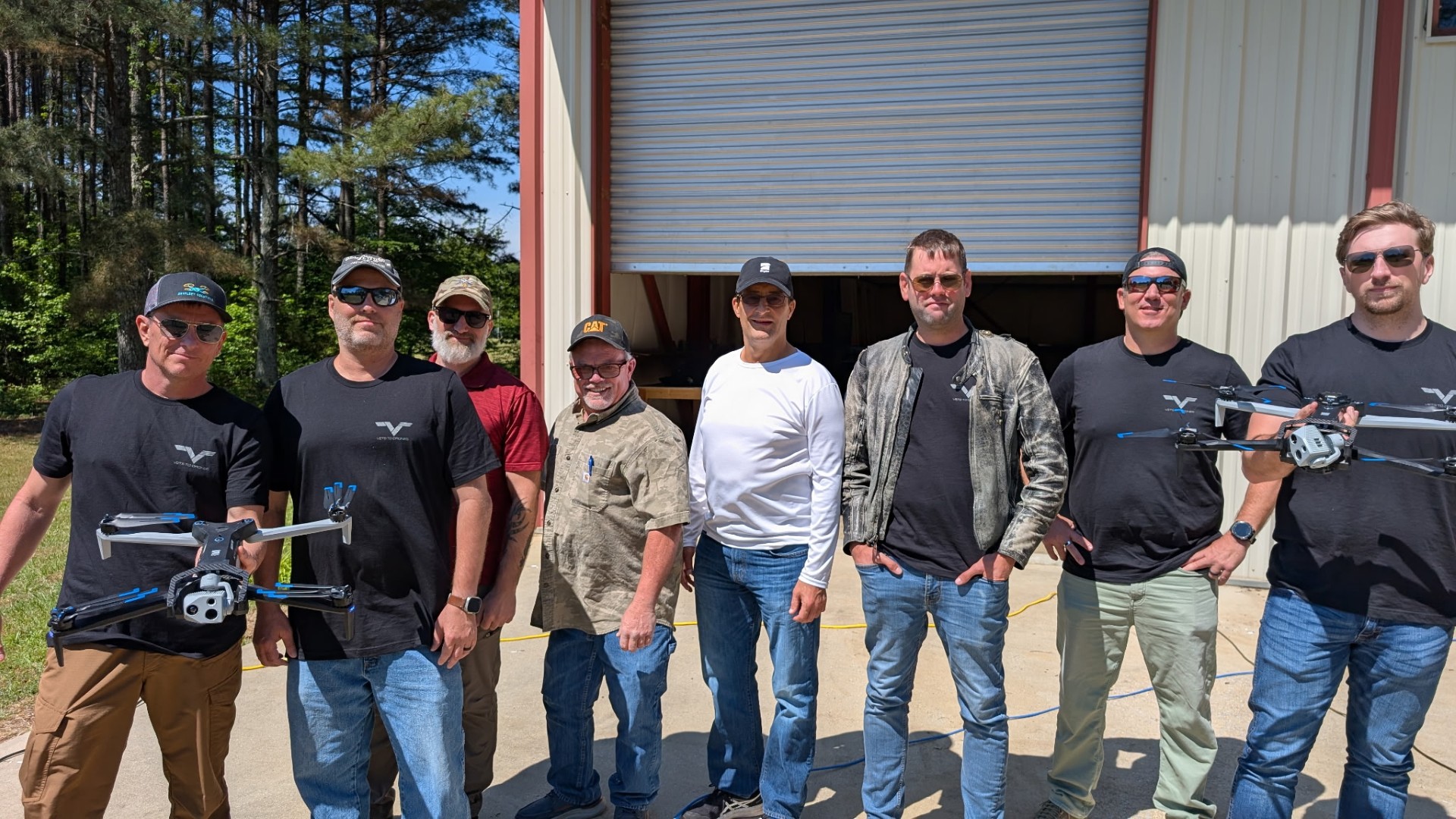 V2D members on-site at a cell tower inspection job